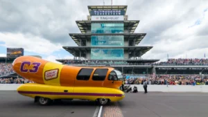 Read more about the article Slaw Dog Sprints to Victory in Inaugural Wienie 500 at Indianapolis Motor Speedway