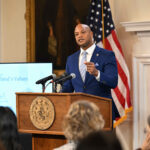 Wes Moore Rejects 2028 Presidential Run, Challenges Trump and Biden on Immigration at National Town Hall