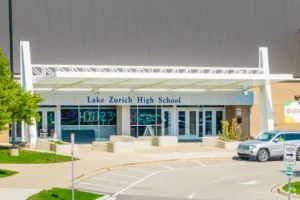 Read more about the article Lake Zurich High School Student Suspended After Viral Punch Over Pro-ICE Sign Sparks National Debate