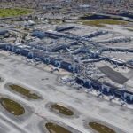 American Airlines Faces Record Flight Disruptions: Could Travel Stocks Be Headed for More Turbulence?